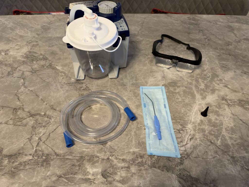 Jackie's microsuction equipment laid out ready for a home visit