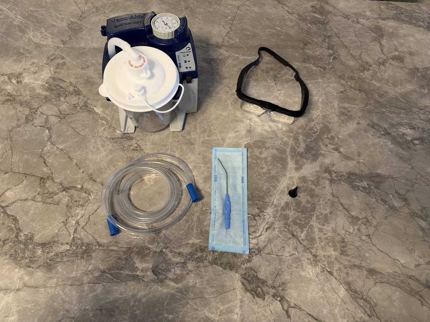 Microsuction ear wax removal equipment: suction unit, tubing, probe and headlamp